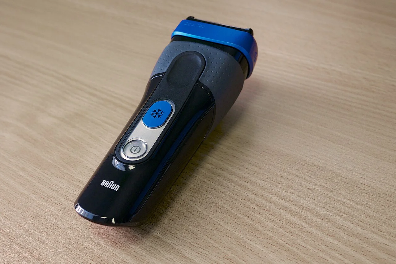 Braun CoolTec CT2cc foil shaver on a wooden surface